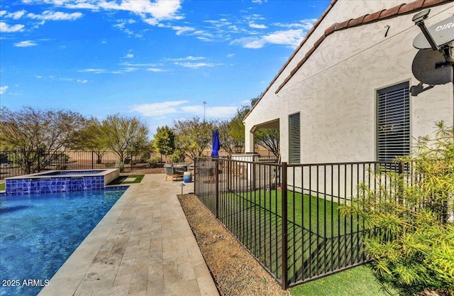 view of swimming pool featuring a fenced in pool, a yard, a fenced backyard, an in ground hot tub, and a patio