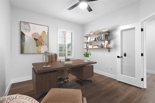 office space with dark hardwood / wood-style flooring and ceiling fan