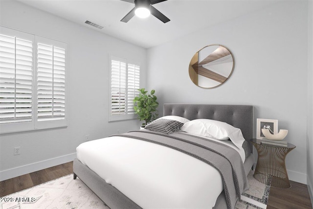 bedroom with ceiling fan and light wood-type flooring