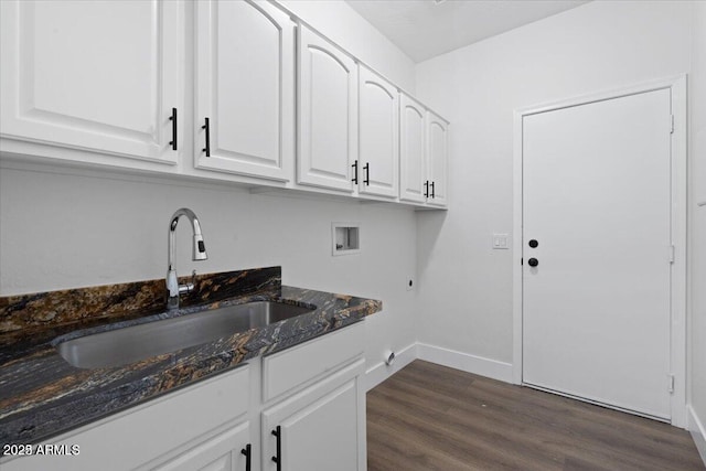 laundry room featuring cabinets, washer hookup, hookup for an electric dryer, sink, and dark hardwood / wood-style floors