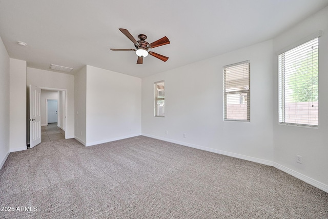 9072 W Myrtle Ave, Glendale, AZ 85305 - unfurnished room featuring light colored carpet, ceiling fan, baseboards, and a smoke detector