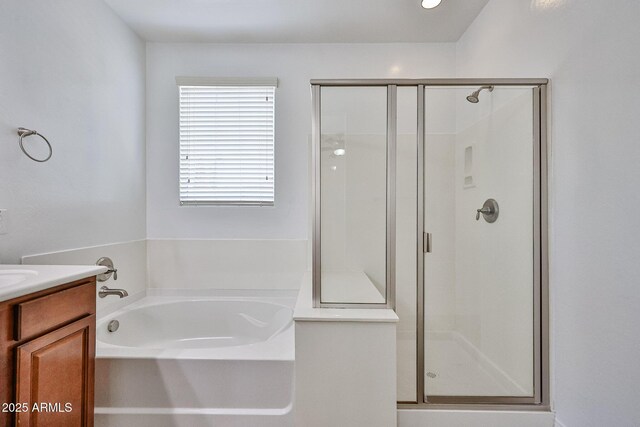 9072 W Myrtle Ave, Glendale, AZ 85305 - bathroom with a shower stall, a garden tub, and vanity