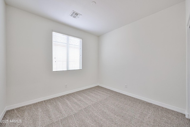 9072 W Myrtle Ave, Glendale, AZ 85305 - spare room featuring carpet flooring and baseboards