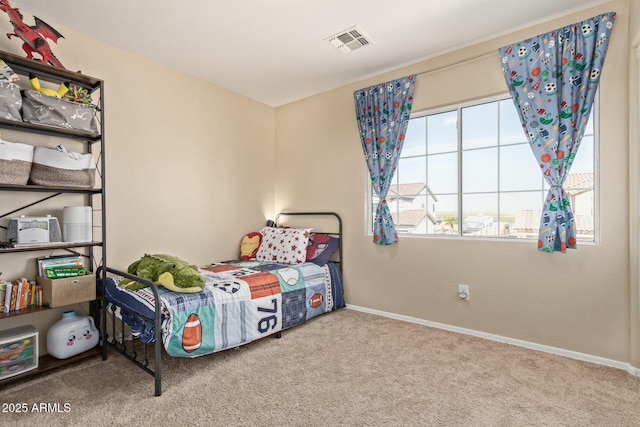 bedroom with carpet, visible vents, and baseboards