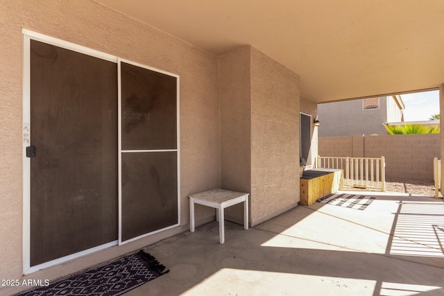 view of patio / terrace with fence