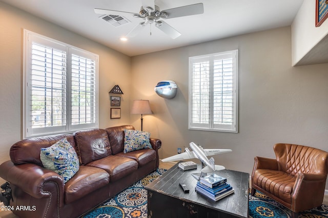 living room with ceiling fan