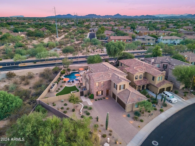 view of aerial view at dusk