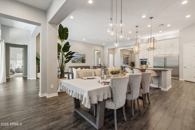 dining area with dark wood-style floors, recessed lighting, visible vents, and baseboards