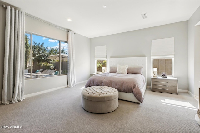 bedroom featuring carpet floors, recessed lighting, visible vents, and baseboards