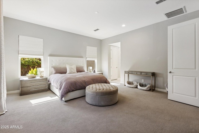 bedroom featuring carpet, visible vents, and baseboards