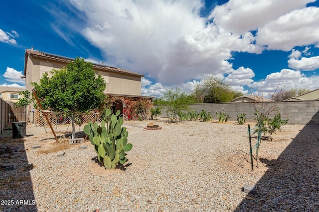 41811 W Avella Dr, Maricopa, AZ 85138 - view of yard with an outdoor fire pit and a fenced backyard
