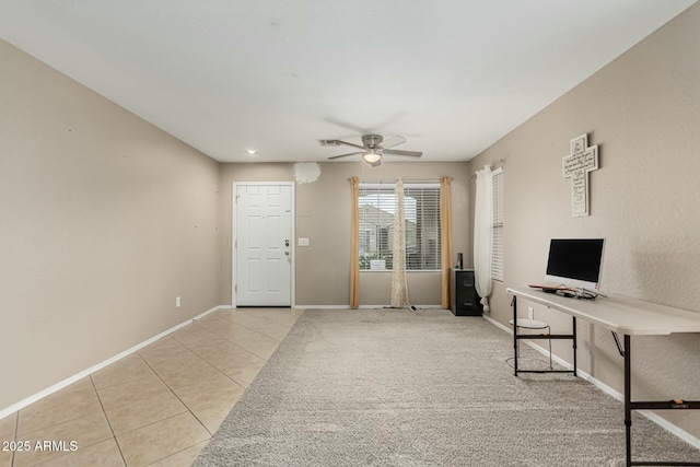 41811 W Avella Dr, Maricopa, AZ 85138 - living room with light tile patterned floors, baseboards, a ceiling fan, and light carpet