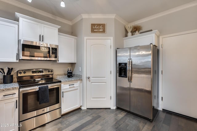 kitchen with stainless steel appliances and white cabinetry