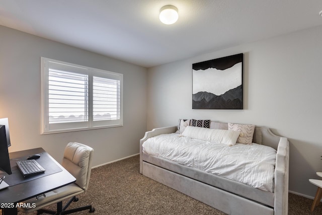 bedroom featuring dark colored carpet