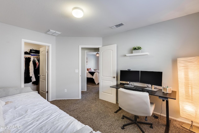 bedroom featuring dark colored carpet