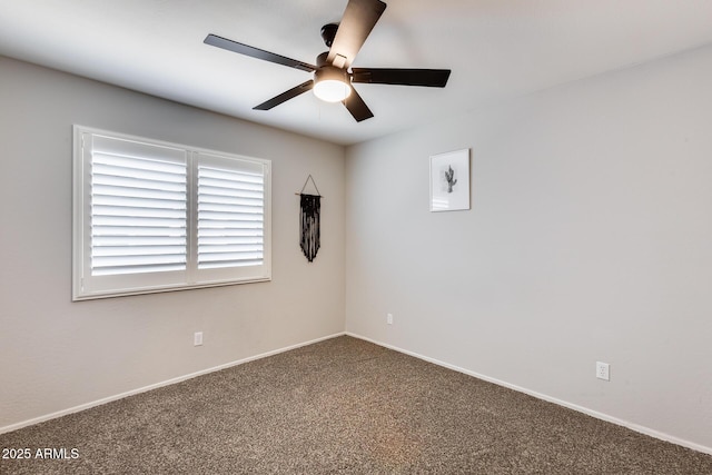 empty room featuring carpet floors and ceiling fan