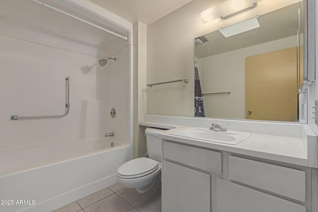 full bathroom featuring tile patterned floors, vanity, toilet, and shower / bath combination