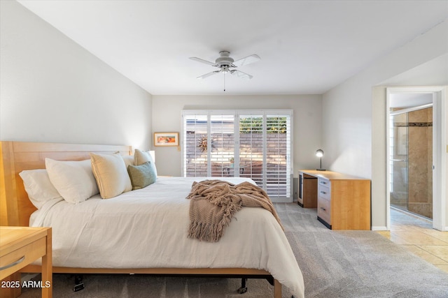 bedroom featuring a ceiling fan and light colored carpet