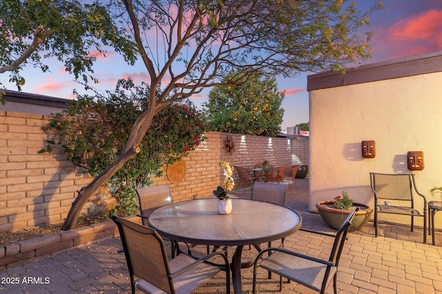 view of patio / terrace with a fenced backyard and outdoor dining area