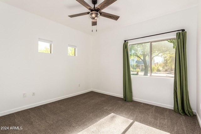 unfurnished room featuring carpet and ceiling fan