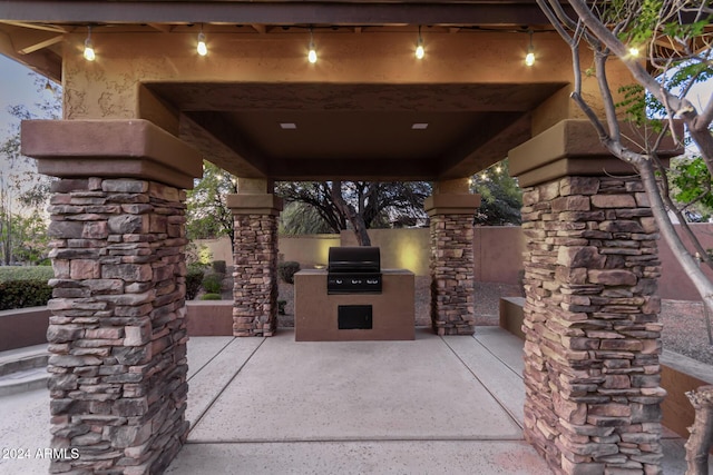 view of patio / terrace featuring area for grilling and exterior kitchen