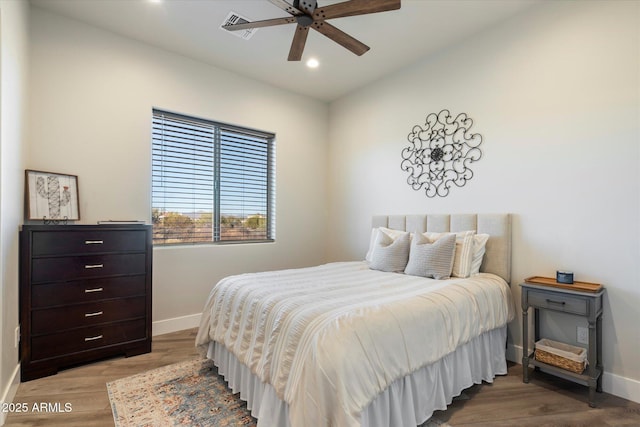 bedroom featuring ceiling fan and hardwood / wood-style floors