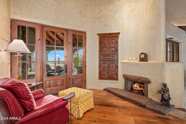 living room featuring french doors and wood-type flooring