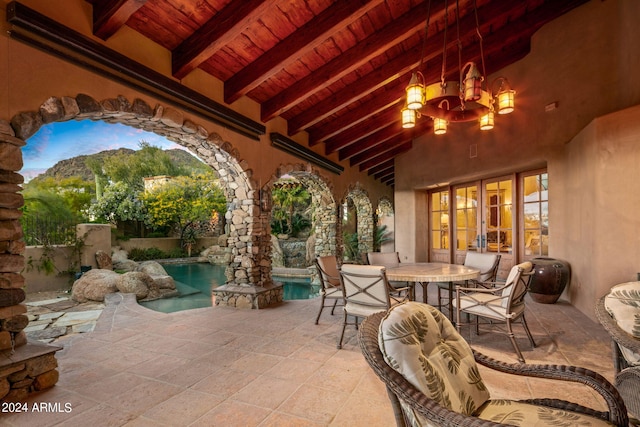 view of patio featuring a fenced in pool