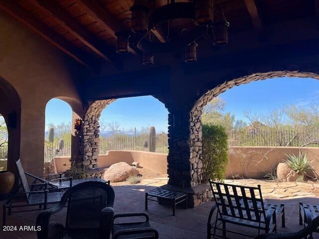 view of terrace featuring ceiling fan