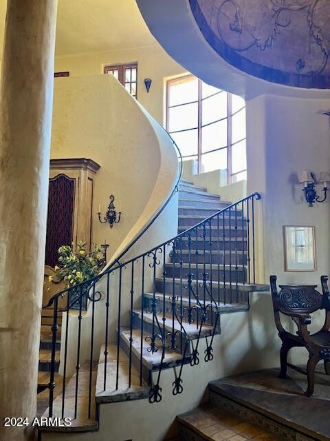 stairs with a towering ceiling