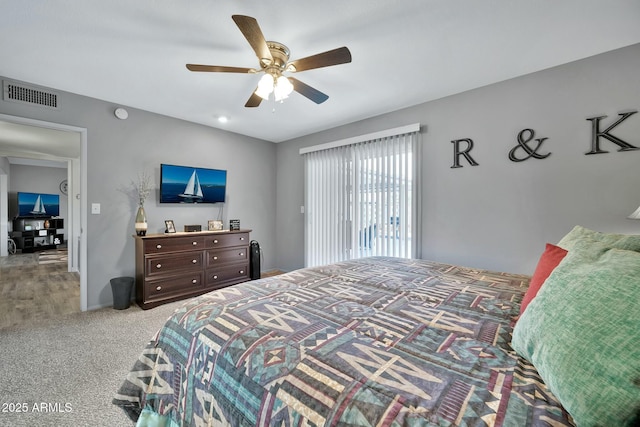 carpeted bedroom featuring ceiling fan