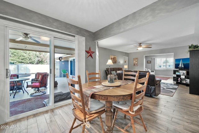 dining area with ceiling fan