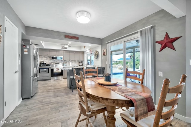 dining room featuring light hardwood / wood-style flooring