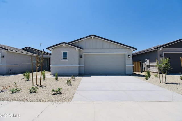 17419 W Via De Luna Dr, Surprise, AZ 85387 - ranch-style home with a garage, driveway, fence, and stucco siding