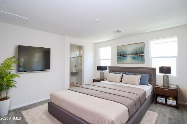 17419 W Via De Luna Dr, Surprise, AZ 85387 - carpeted bedroom with baseboards and ensuite bathroom