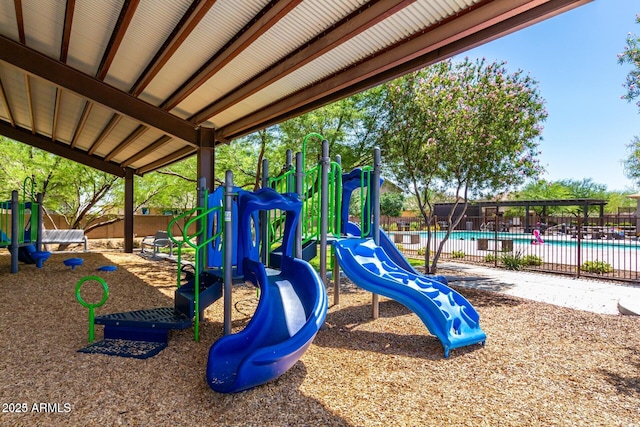17419 W Via De Luna Dr, Surprise, AZ 85387 - community jungle gym featuring fence and a community pool