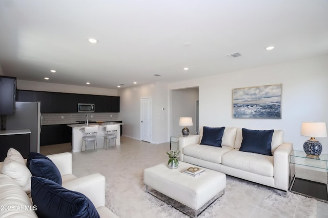 17419 W Via De Luna Dr, Surprise, AZ 85387 - living room featuring recessed lighting and light tile patterned floors