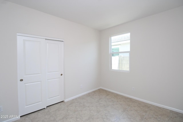 17419 W Via De Luna Dr, Surprise, AZ 85387 - spare room featuring baseboards