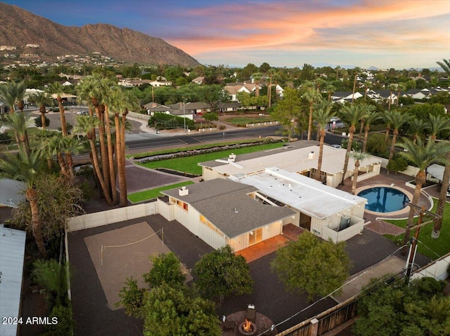 aerial view at dusk with a mountain view