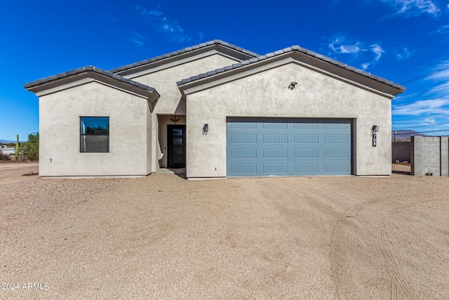 view of front of home with a garage