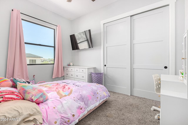 carpeted bedroom with a closet