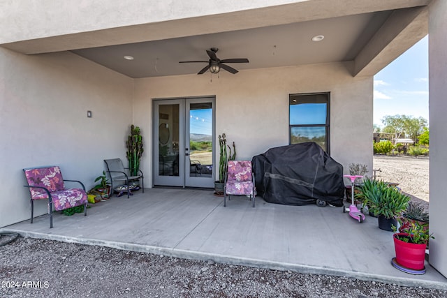 view of patio / terrace featuring area for grilling and ceiling fan