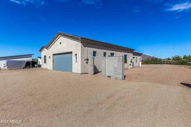 view of home's exterior with a garage