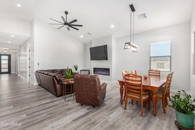 dining space featuring light hardwood / wood-style floors, a healthy amount of sunlight, and ceiling fan