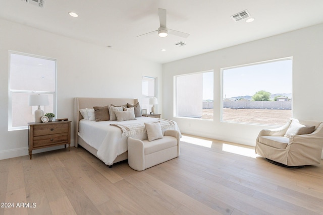 bedroom featuring wood-type flooring and ceiling fan