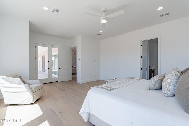 bedroom with ceiling fan, french doors, light wood-type flooring, and access to exterior