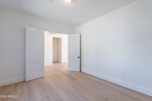 empty room featuring light hardwood / wood-style flooring