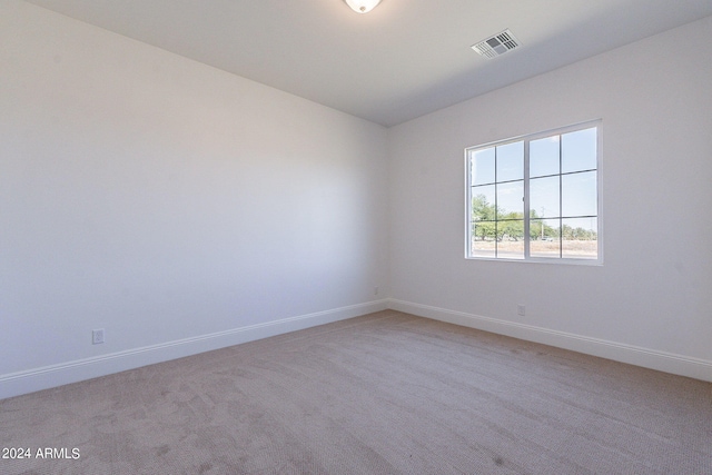 spare room with carpet floors