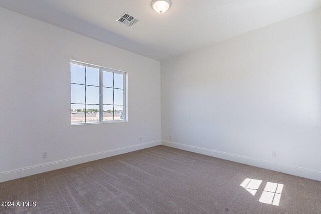 spare room with carpet flooring