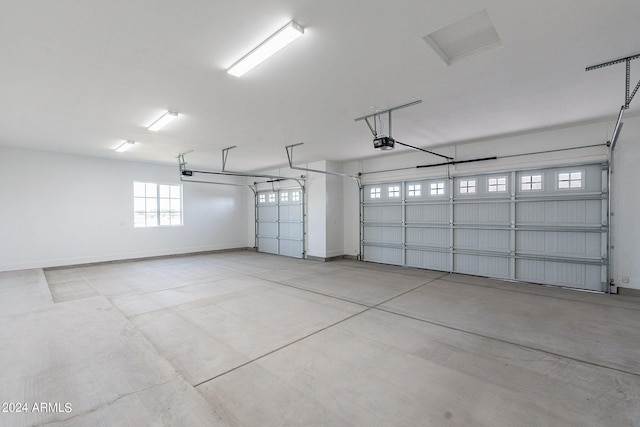 garage featuring a garage door opener